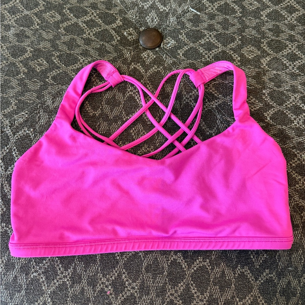 Bright pink Lululemon free to be bra